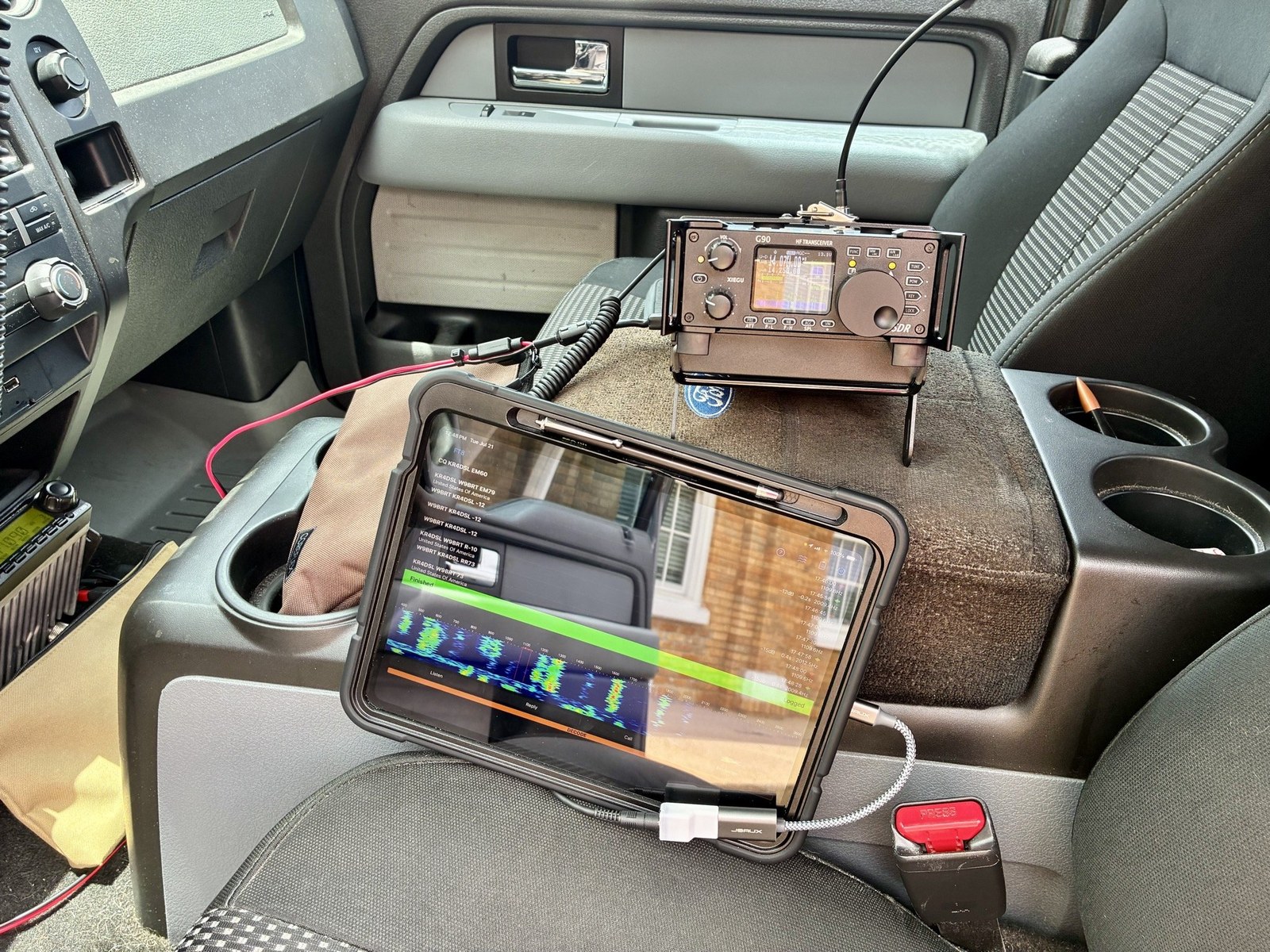 Xiegu G90 and a tablet running FT8 in a truck cab